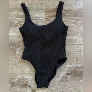Black one piece scrunch bathing suit